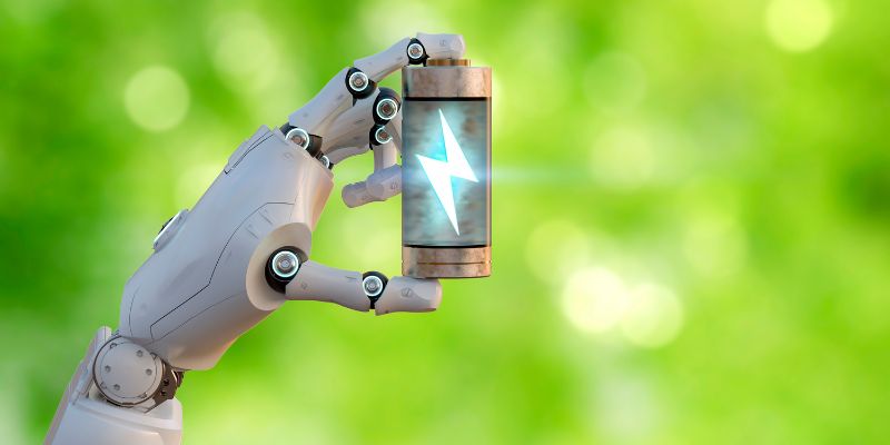A robot holding a battery.