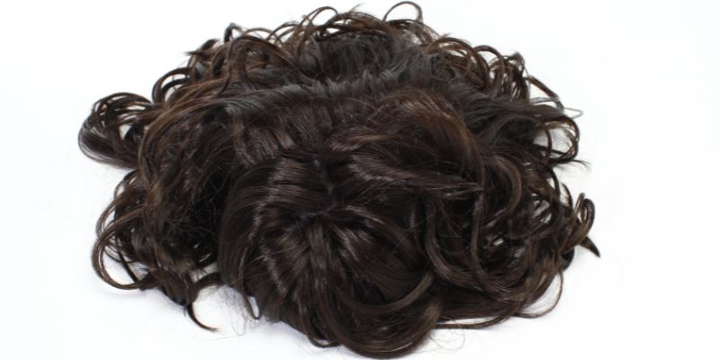 A short dark brown wig.
