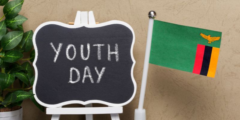 Black Board With Youth Day Written and Zambia Flag