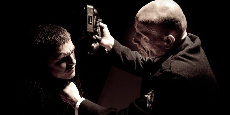 A detective roughing up a suspect