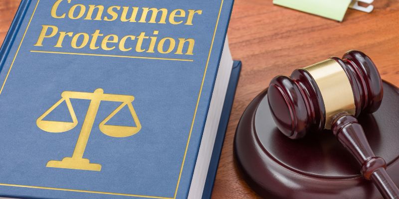Consumer protection law book next to a gavel