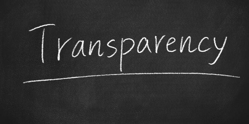 Black board with "Transparency" written on it
