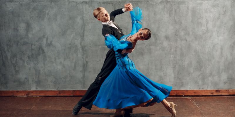 A pair of people doing the Waltz