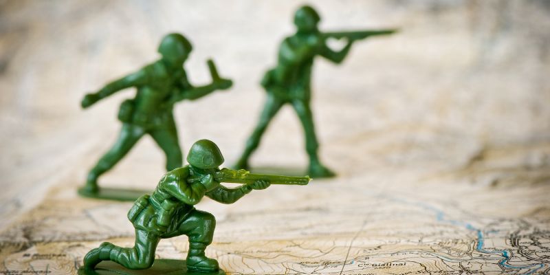Three toy soldiers