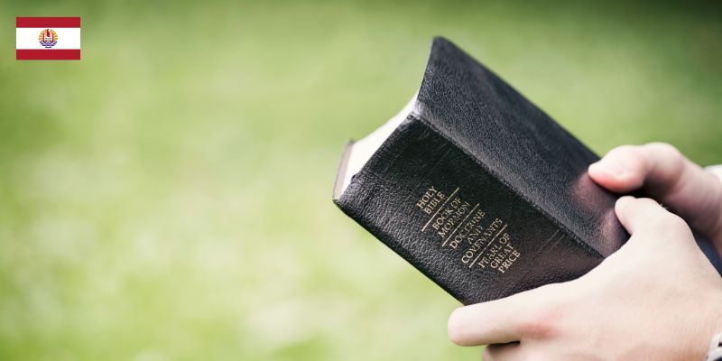Someone holding a bible