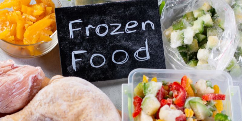 Frozen Food sign surrounded by frozen foods.