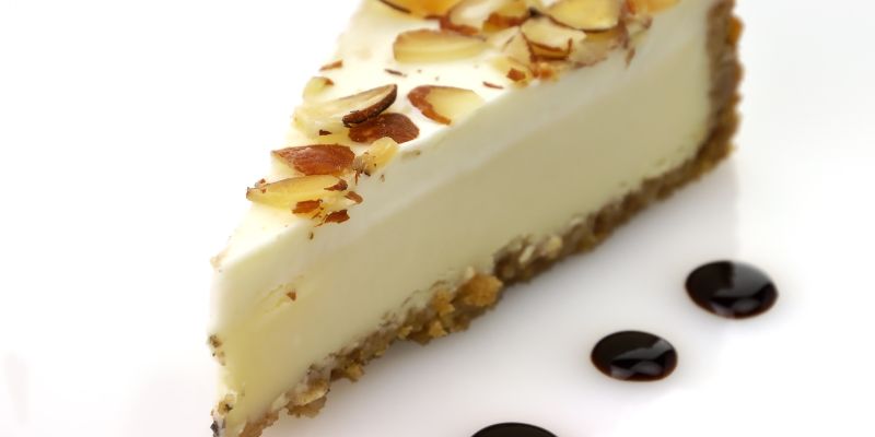 a slice of white chocolate cheesecake
