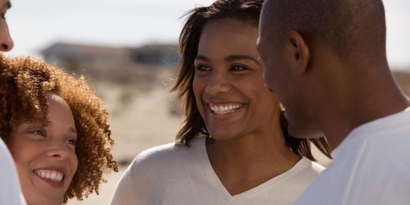 People smiling at each other.