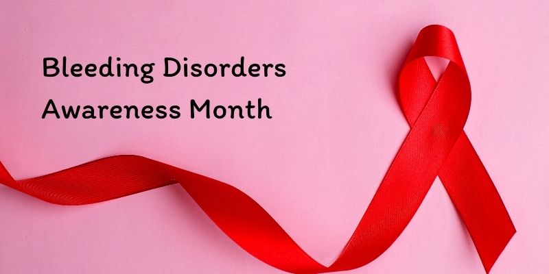 Red ribbon representing bleeding disorder awareness month