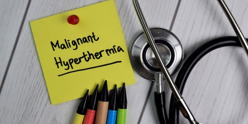 A post it with "Malignant Hyperthermia" next to a thethoscope