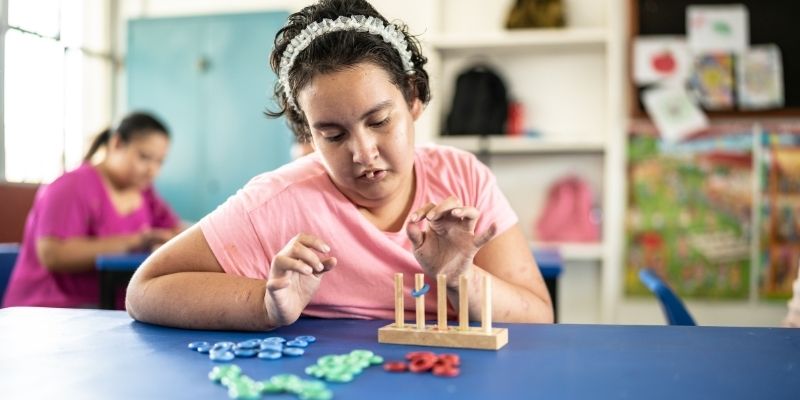 An adorable child with mental disabilities