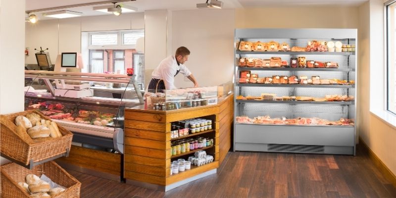 A butcher in a meat shop