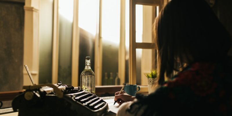 A writer working at a desk