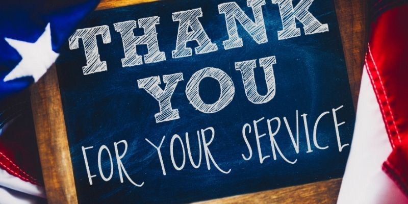 A patriotic sign that reads Thank You for Your Service
