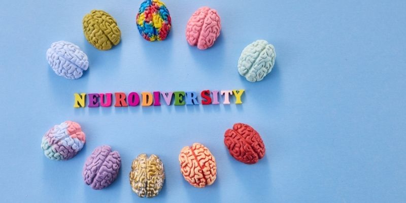 A sign that says neurodiversity and a brain.